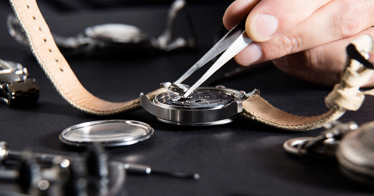 Leather watch opened with repair tools